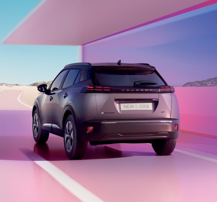 NEW SUV PEUGEOT E-2008, rear view on road